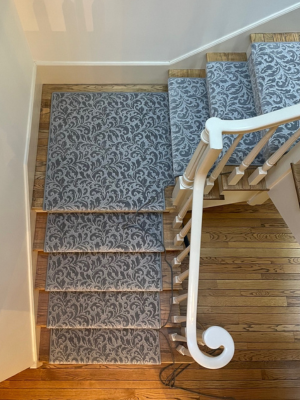 Grey carpet stair runner