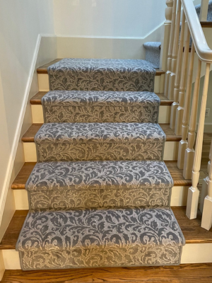 Grey carpet stair runner